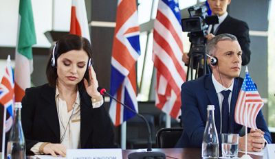 Government translators wearing headphones