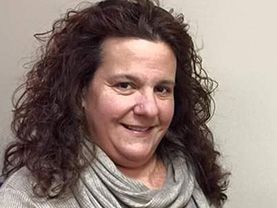 Headshot of Angela Piteris, VP of Interpreter Operations